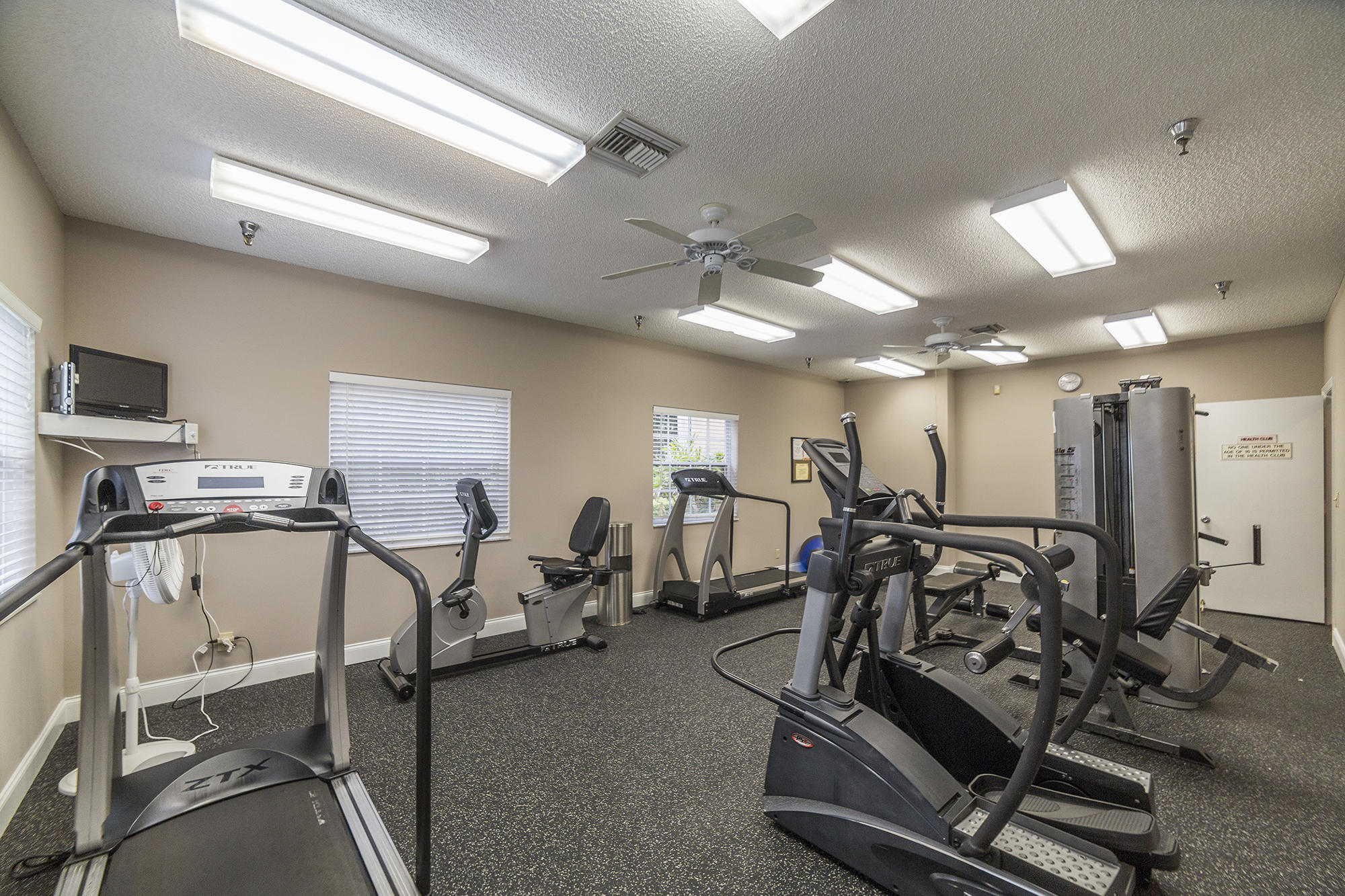 11151 Autoro Court Boca Raton, FL 33498 - Photo 61 of 70 a view of a room with gym equipment