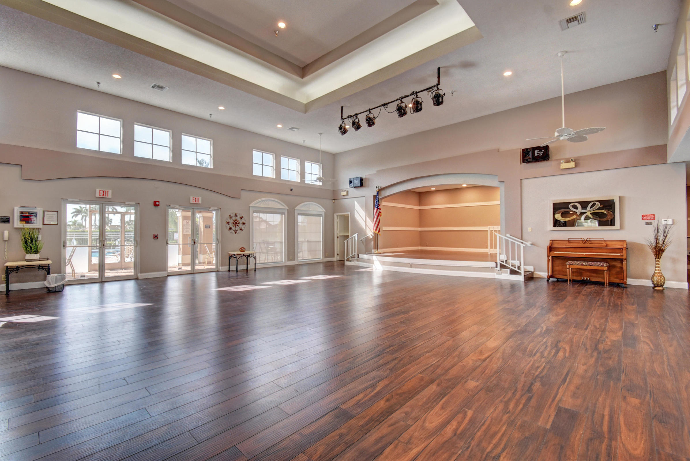 11151 Autoro Court Boca Raton, FL 33498 - Photo 63 of 70 a view of empty room with wooden floor and windows