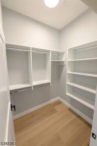 a view of an empty room with empty racks