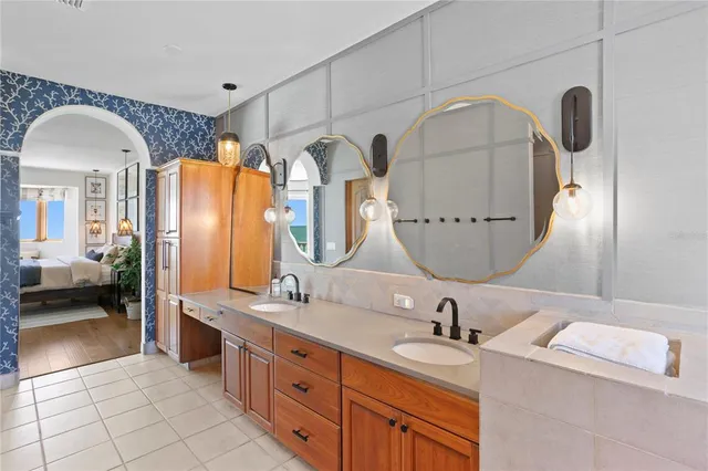 a kitchen with stainless steel appliances a sink and cabinets