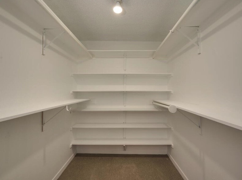 3 Hull Circle Austin, TX 78746 - Photo 21 of 32 a view of an empty walk in closet