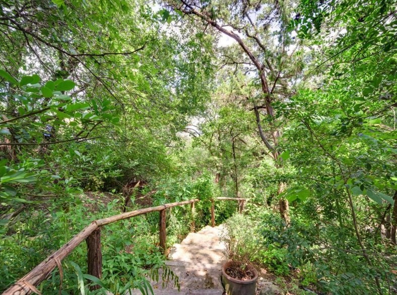 3 Hull Circle Austin, TX 78746 - Photo 28 of 32 a view of a city from a balcony