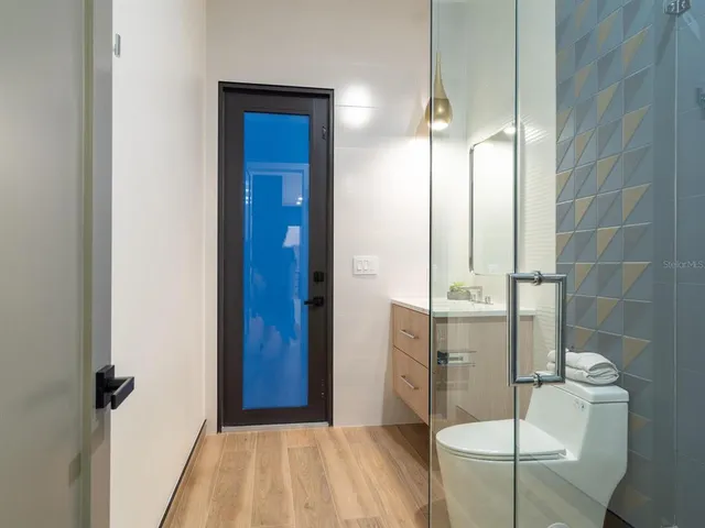 a view of swimming pool with outdoor seating