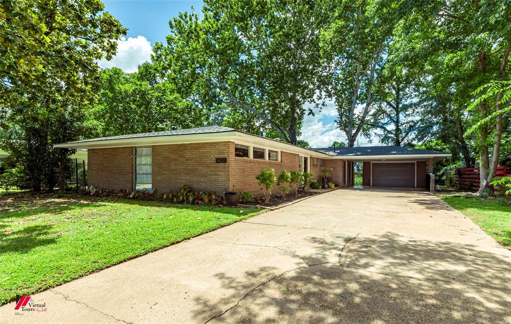 5822 River Road Shreveport, LA 71105 - Photo 1 of 35 a front view of house with yard and trees