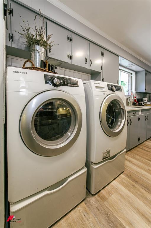 5822 River Road Shreveport, LA 71105 - Photo 12 of 35 a utility room with dryer and washer