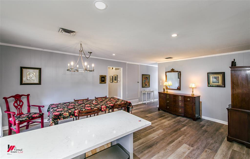 5822 River Road Shreveport, LA 71105 - Photo 13 of 35 a view of a dining room with furniture and wooden floor