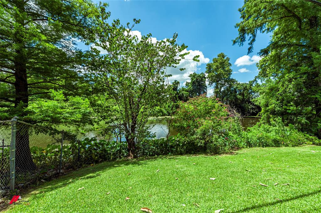 5822 River Road Shreveport, LA 71105 - Photo 29 of 35 a view of a lush green space