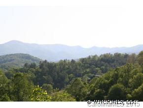 Tbd Walnut Ridge Drive, Unit 2A Clyde, NC 28721 - Photo 3 of 6 a view of a city with lush green forest