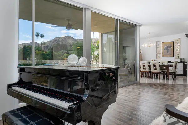 a room with furniture and wooden floor