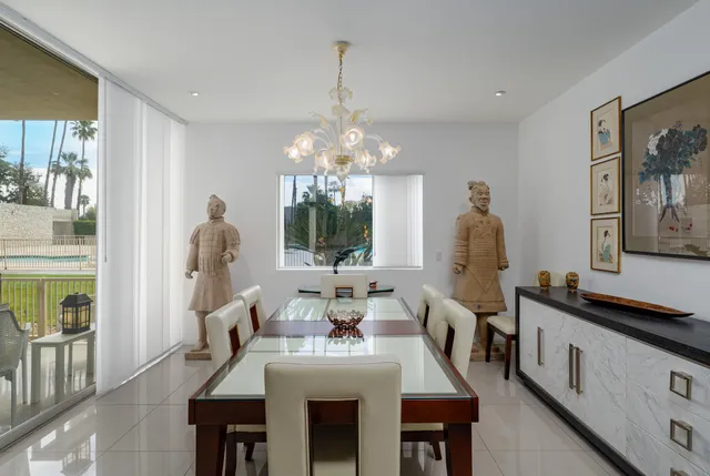 a kitchen with granite countertop a sink and cabinets