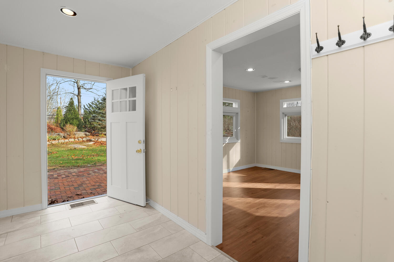 270 Smith Ridge Road New Canaan, CT 06840 - Photo 15 of 36 a view of an entryway with wooden floor and garden