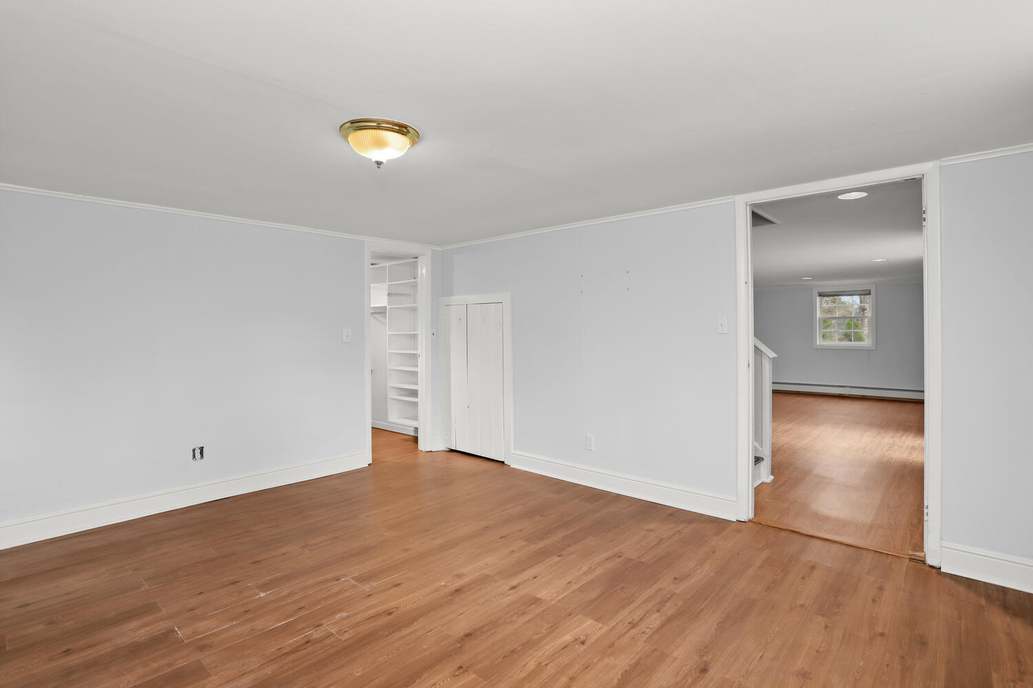 270 Smith Ridge Road New Canaan, CT 06840 - Photo 27 of 36 wooden floor in an empty room with a window