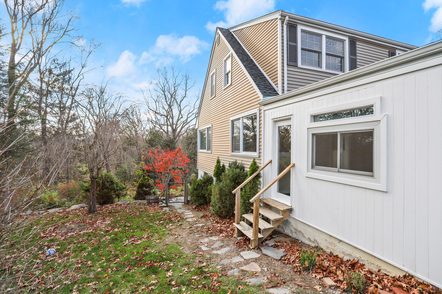 270 Smith Ridge Road New Canaan, CT 06840 - Photo 28 of 36 a front view of a house with garden