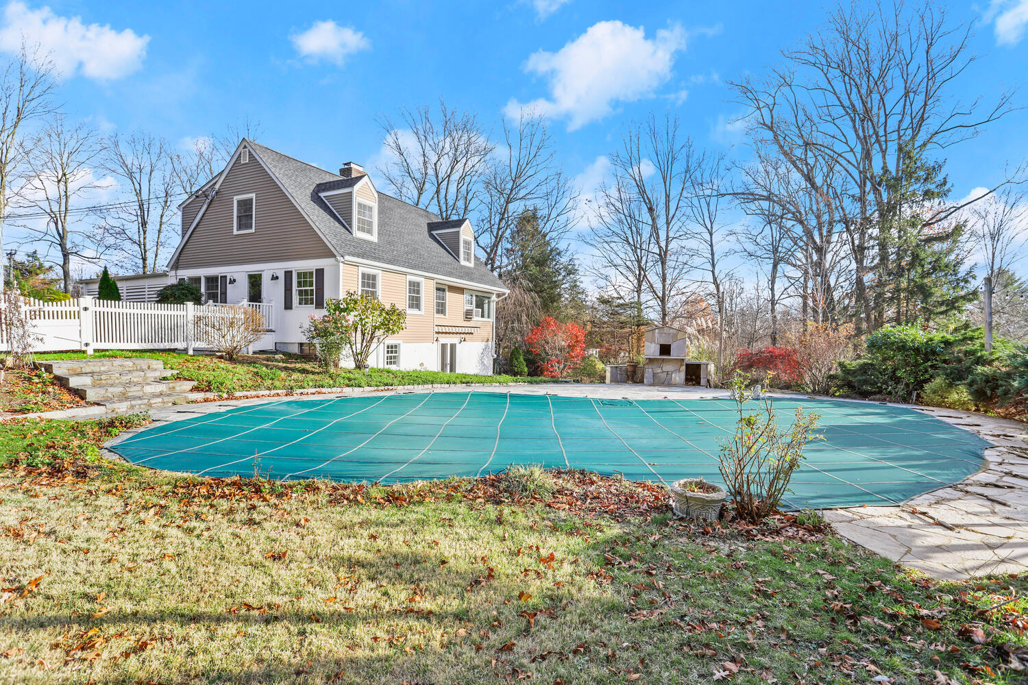 270 Smith Ridge Road New Canaan, CT 06840 - Photo 30 of 36 a front view of a house with a yard