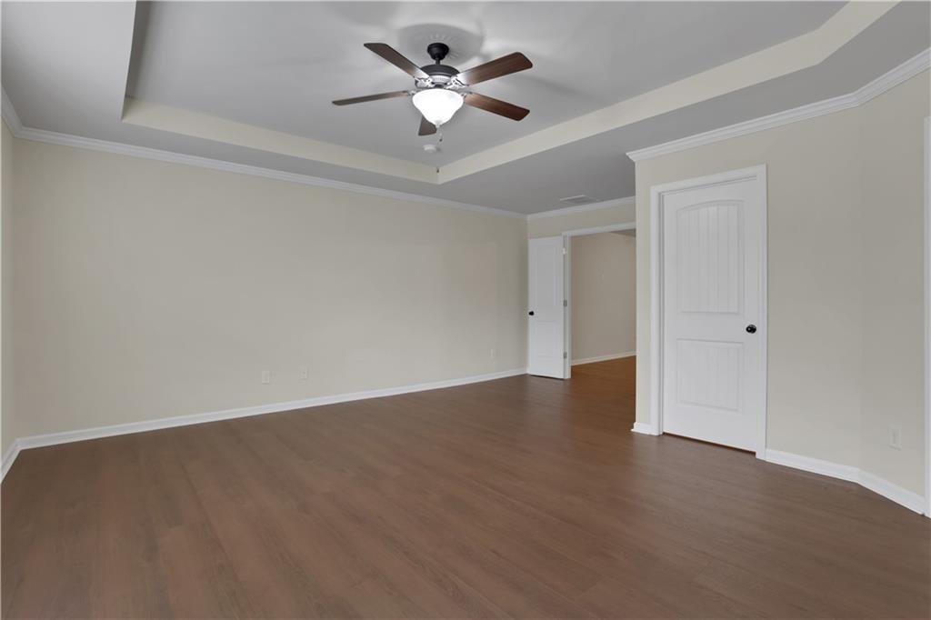 2526 Morgan Chase Drive Buford, GA 30519 - Photo 21 of 44 an empty room with fan and a ceiling fan