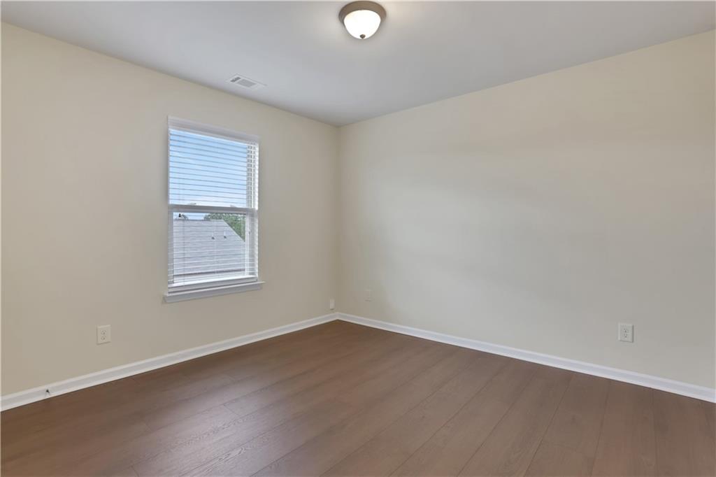 2526 Morgan Chase Drive Buford, GA 30519 - Photo 31 of 44 an empty room with a window