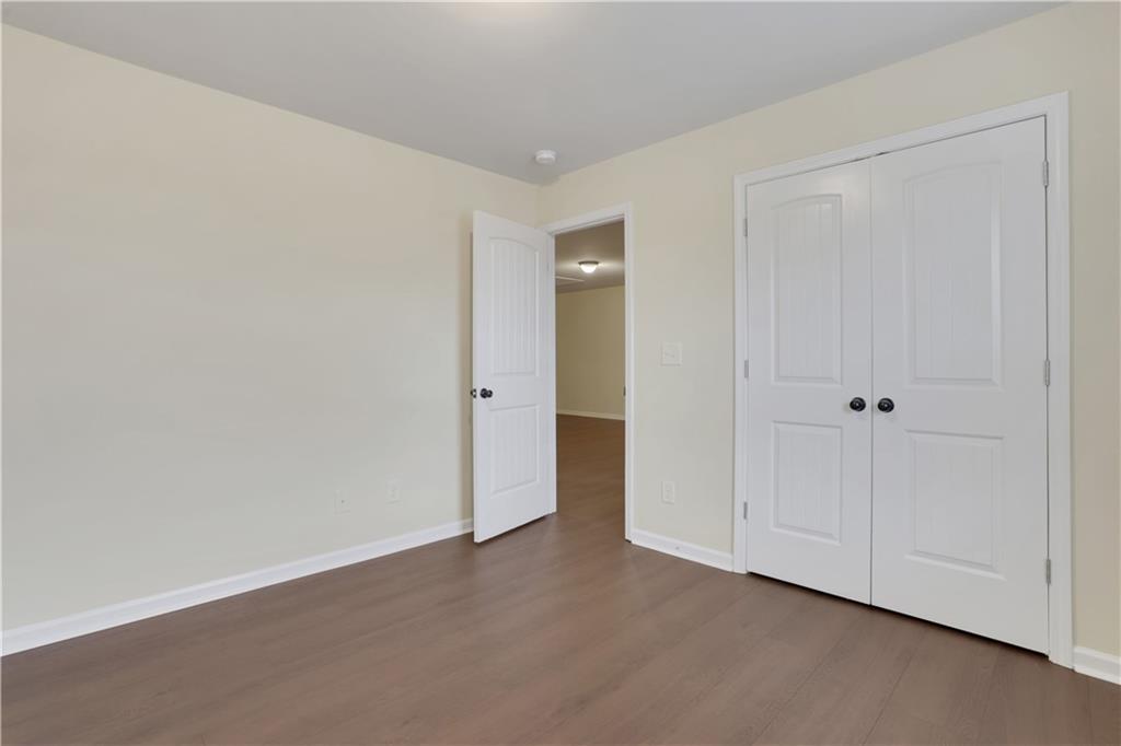 2526 Morgan Chase Drive Buford, GA 30519 - Photo 32 of 44 a view of an empty room