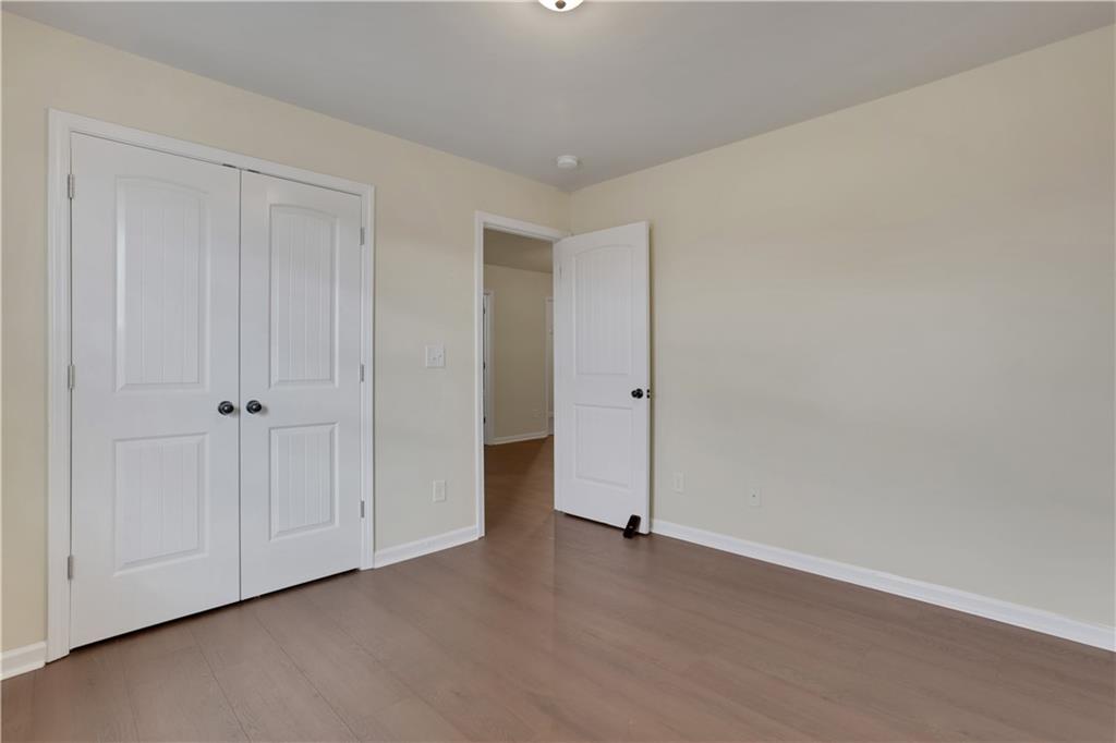 2526 Morgan Chase Drive Buford, GA 30519 - Photo 34 of 44 a view of an empty room