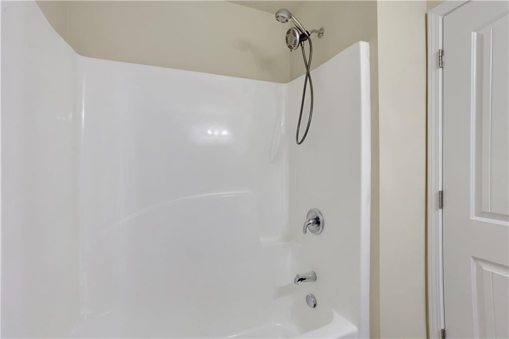 2526 Morgan Chase Drive Buford, GA 30519 - Photo 36 of 44 a bathroom with a shower