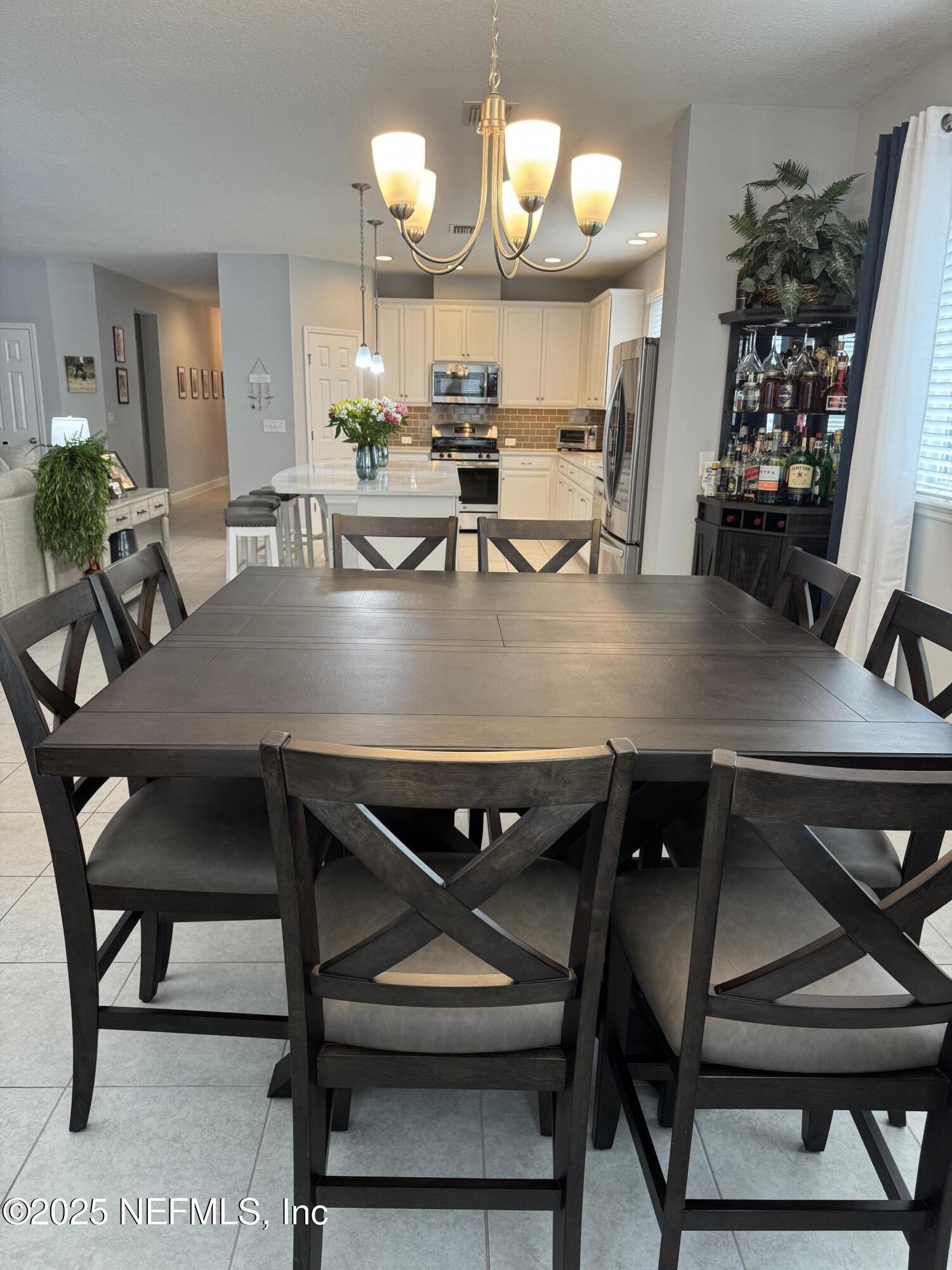 151 Woodsong Lane St. Augustine, FL 32092 - Photo 11 of 43 Dining Room/Kitchen