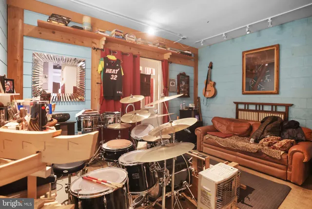 a view of a workspace with furniture