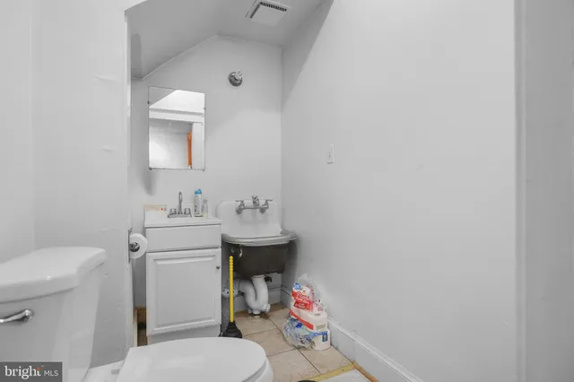 a view of a livingroom with furniture and window