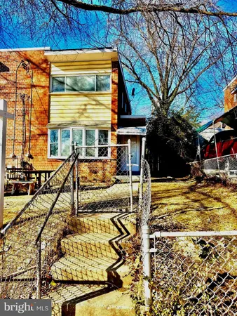 a view of a house with swimming pool