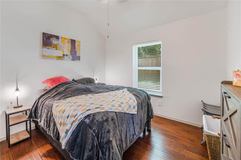 2813 Ridgemere Drive Flower Mound, TX 75028 - Photo 12 of 18 a bedroom with a bed and a window
