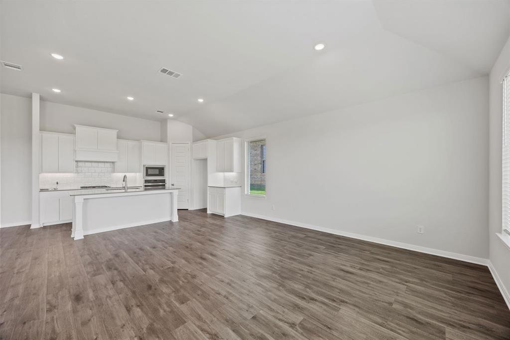 1502 Red Clover Avenue Van Alstyne, TX 75495 - Photo 13 of 27 a view of kitchen with wooden floor