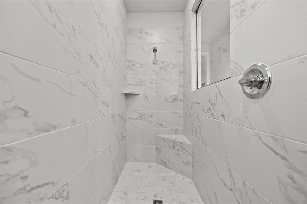 1502 Red Clover Avenue Van Alstyne, TX 75495 - Photo 17 of 27 a bathroom with a bathtub