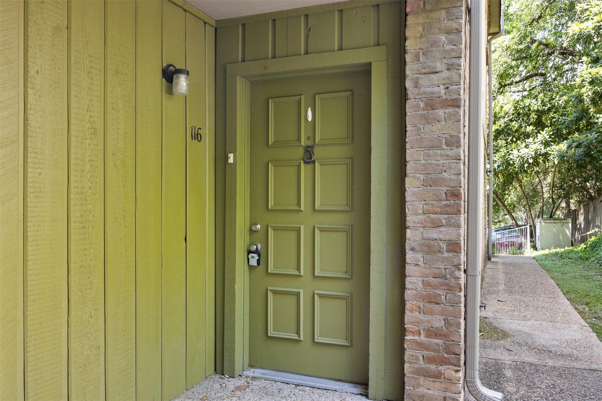 620 South 1st Street, Unit 116 Austin, TX 78704 - Photo 19 of 19 a view of a wooden door