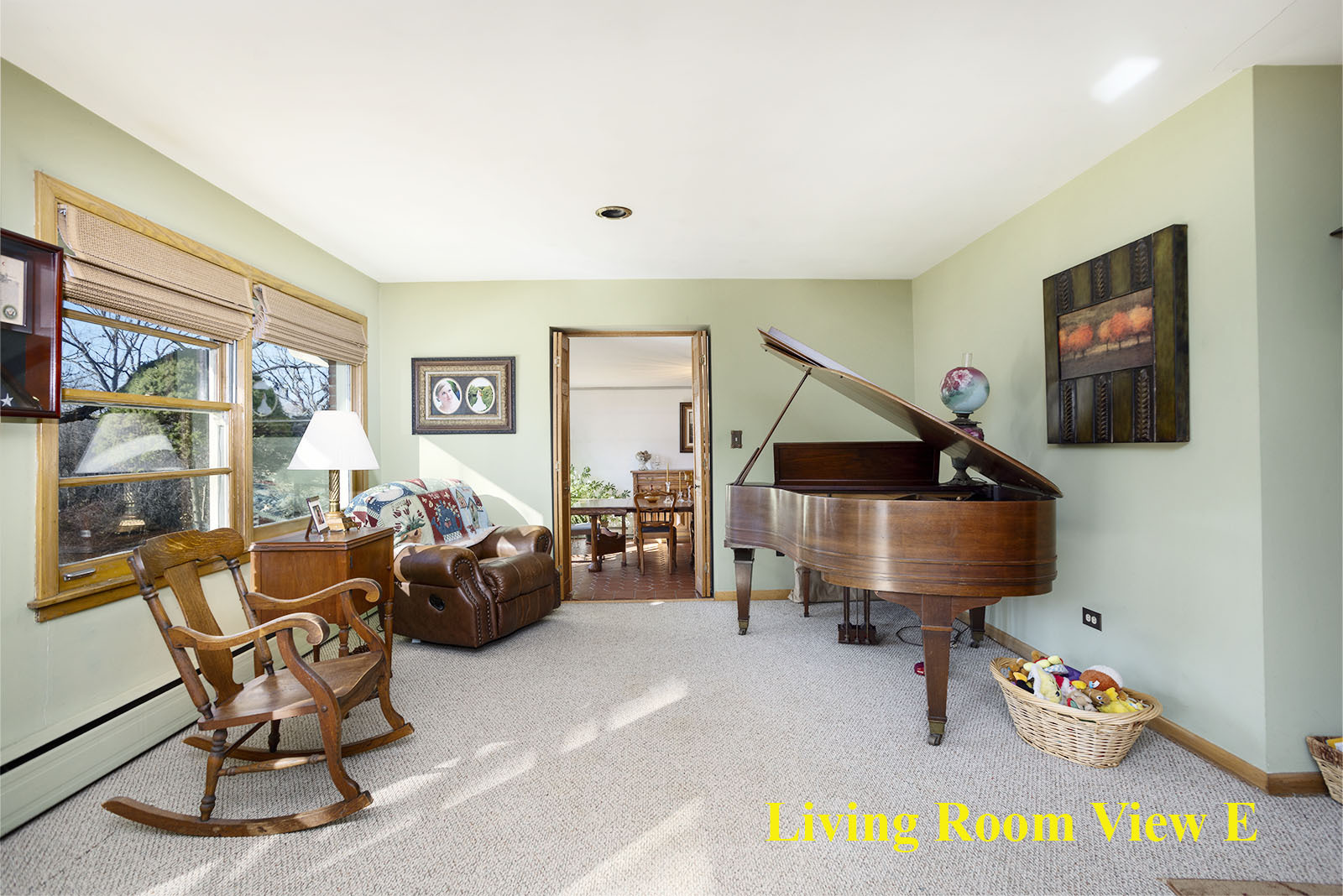 21071 North Valley Road Kildeer, IL 60047 - Photo 8 of 34 a living room with furniture and a flat screen tv