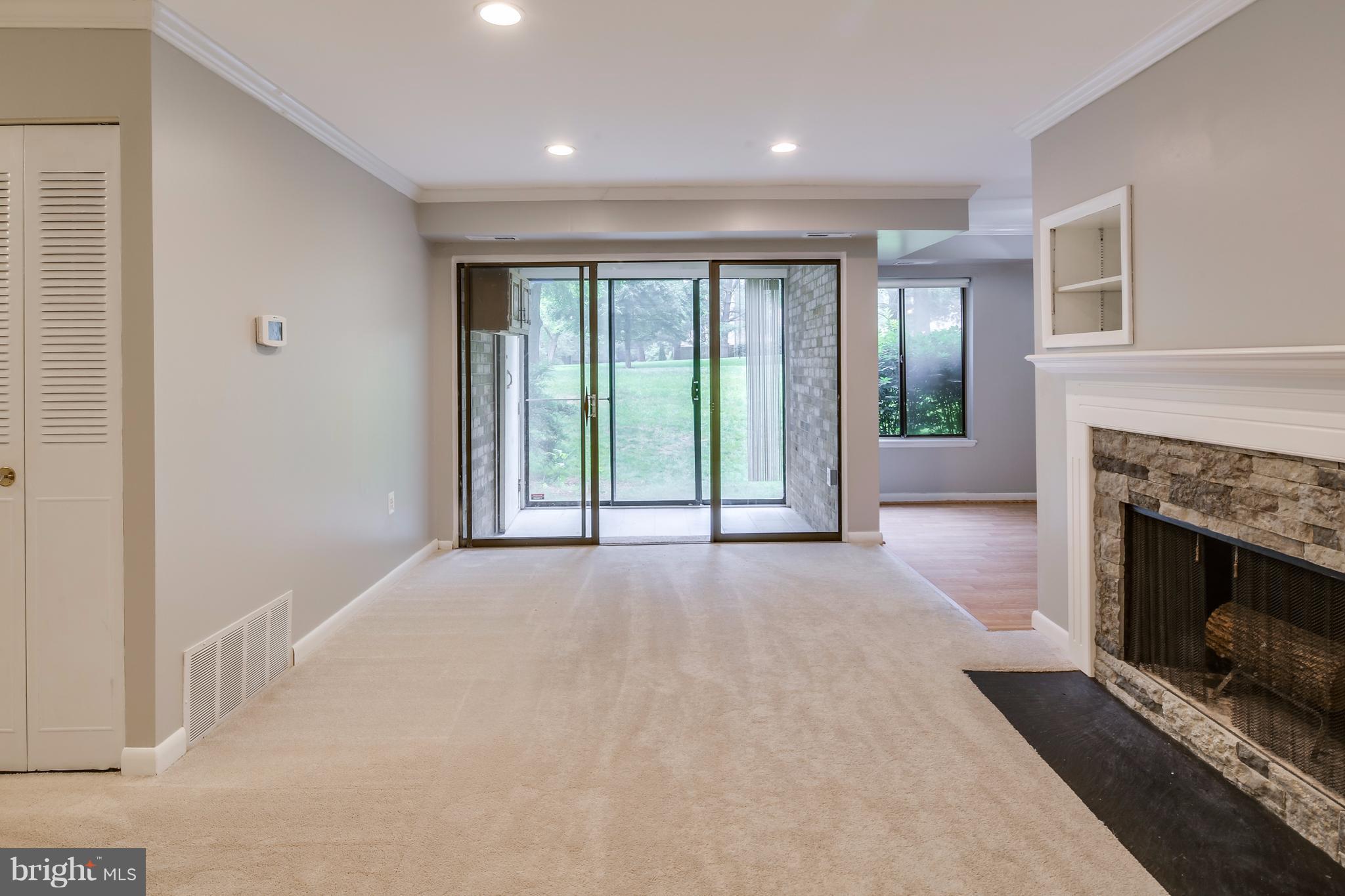 10547 Twin Rivers Road, Unit B1 Columbia, MD 21044 - Photo 12 of 30 Living Room with Access to Sun Room