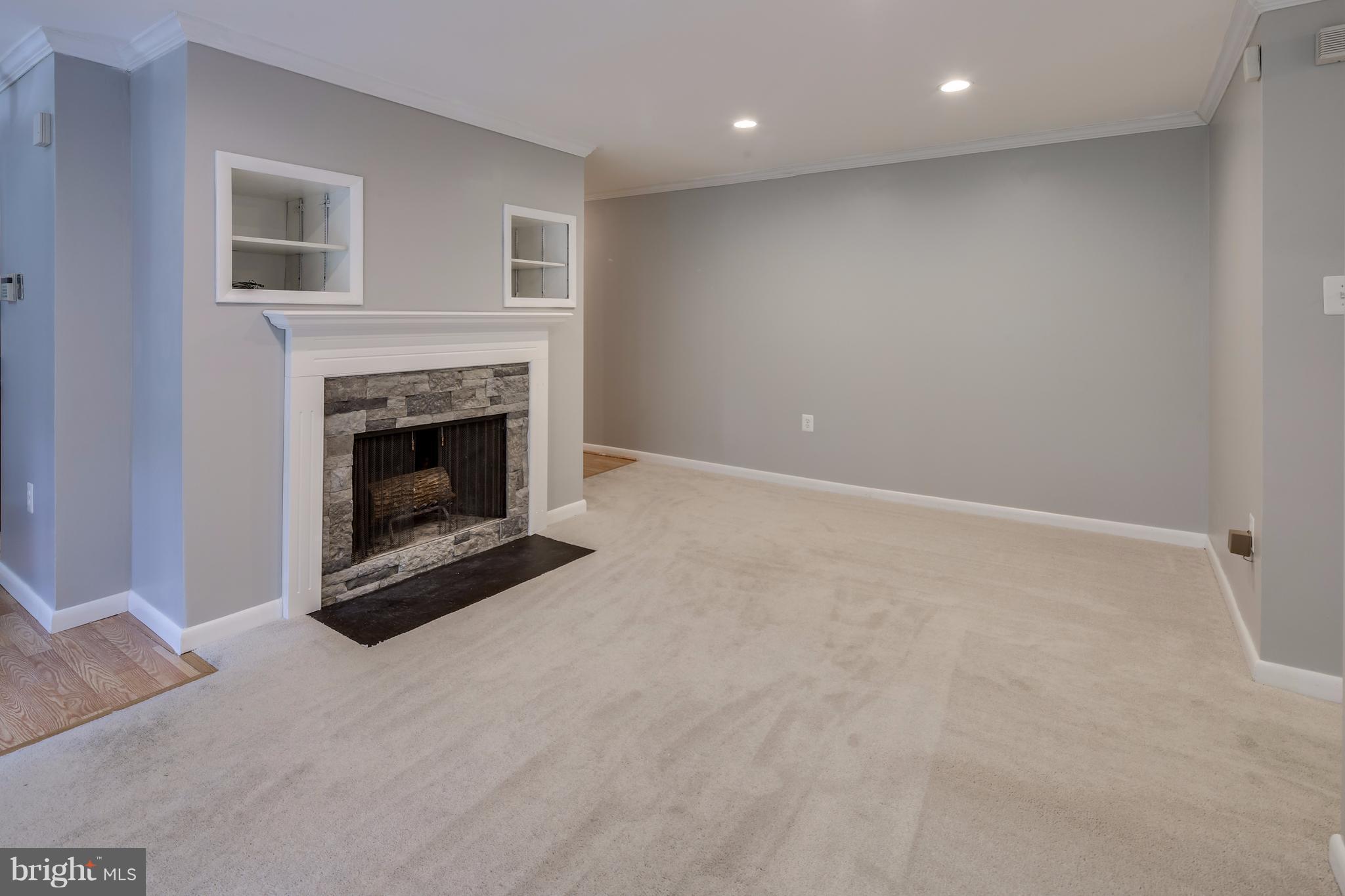 10547 Twin Rivers Road, Unit B1 Columbia, MD 21044 - Photo 13 of 30 Built In Shelving for Entertainment Center
