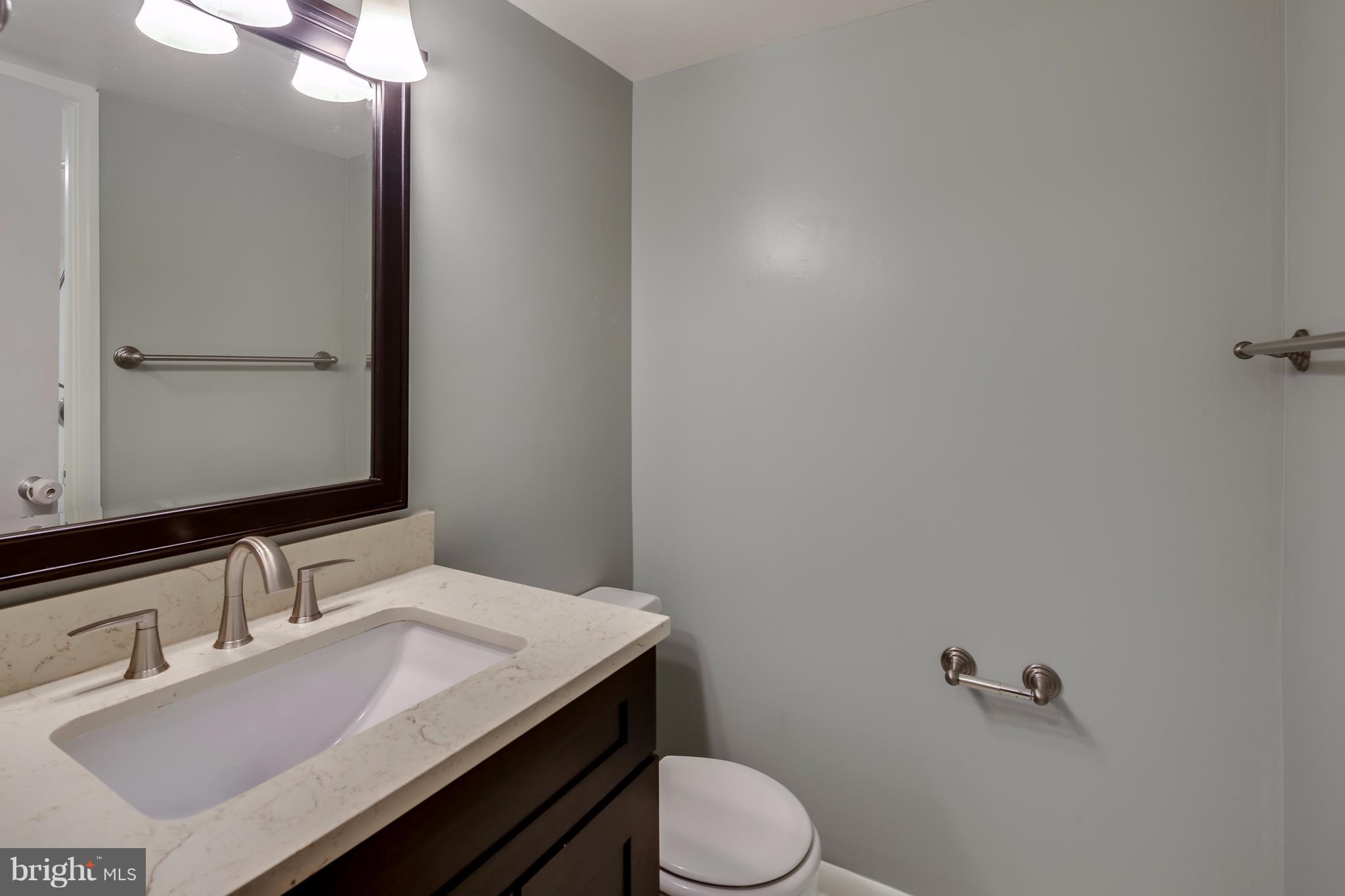 10547 Twin Rivers Road, Unit B1 Columbia, MD 21044 - Photo 25 of 30 Half Bath with Access From Hallway