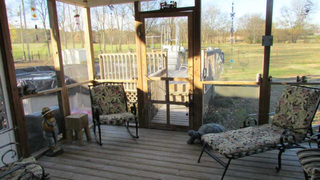 3320 Booker Ridge Road Mount Pleasant, TN 38474 - Photo 4 of 13 INSIDE VIEW OF SCREENED IN BACK PORCH