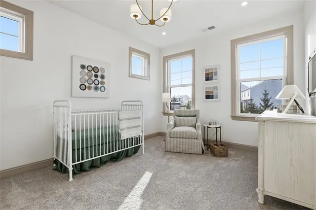 a view of a livingroom with furniture and windows