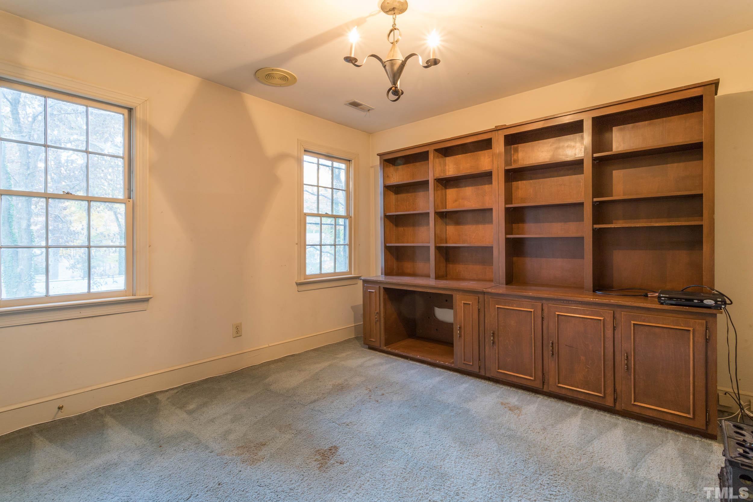 704 Blenheim Drive Raleigh, NC 27612 - Photo 20 of 23 a view of an empty room with a window
