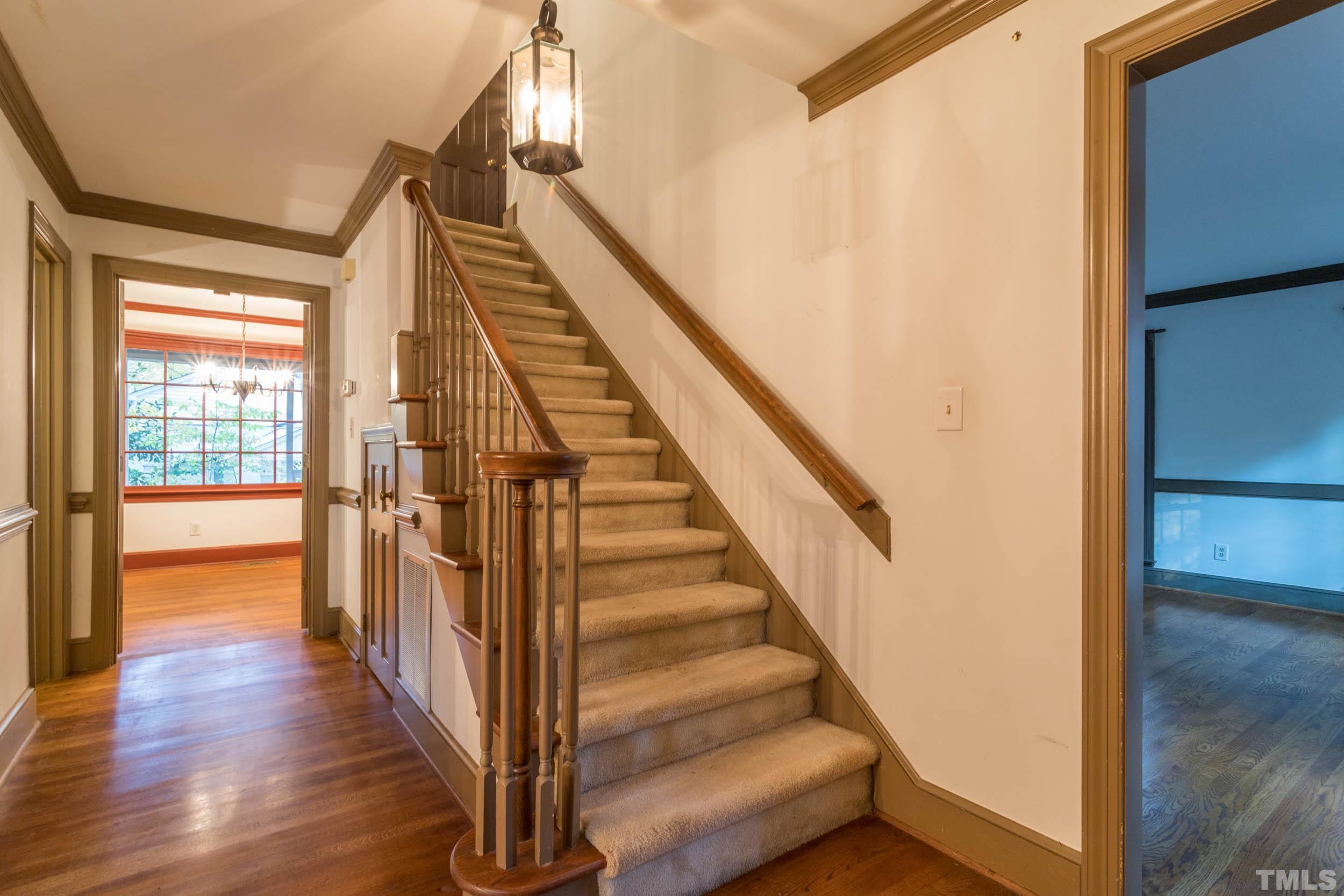704 Blenheim Drive Raleigh, NC 27612 - Photo 3 of 23 a view of an entryway with wooden floor