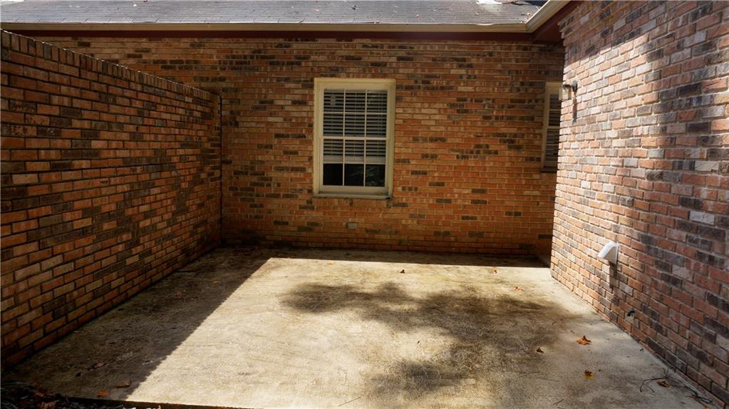 3763 Ashford Dunwoody Road Northeast Brookhaven, GA 30319 - Photo 13 of 14 a view of house with a window