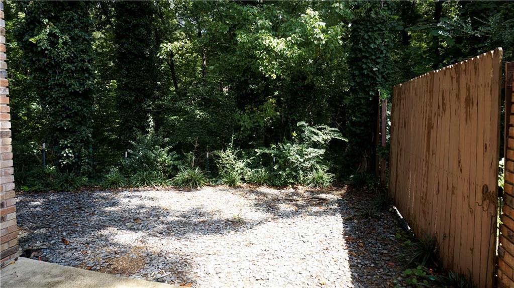 3763 Ashford Dunwoody Road Northeast Brookhaven, GA 30319 - Photo 14 of 14 a view of a backyard of the house