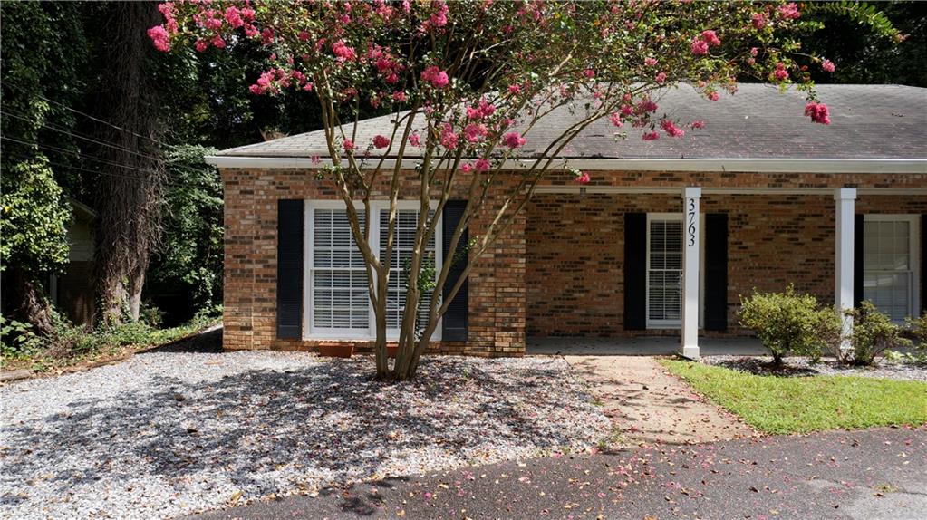 3763 Ashford Dunwoody Road Northeast Brookhaven, GA 30319 - Photo 2 of 14 a front view of a house