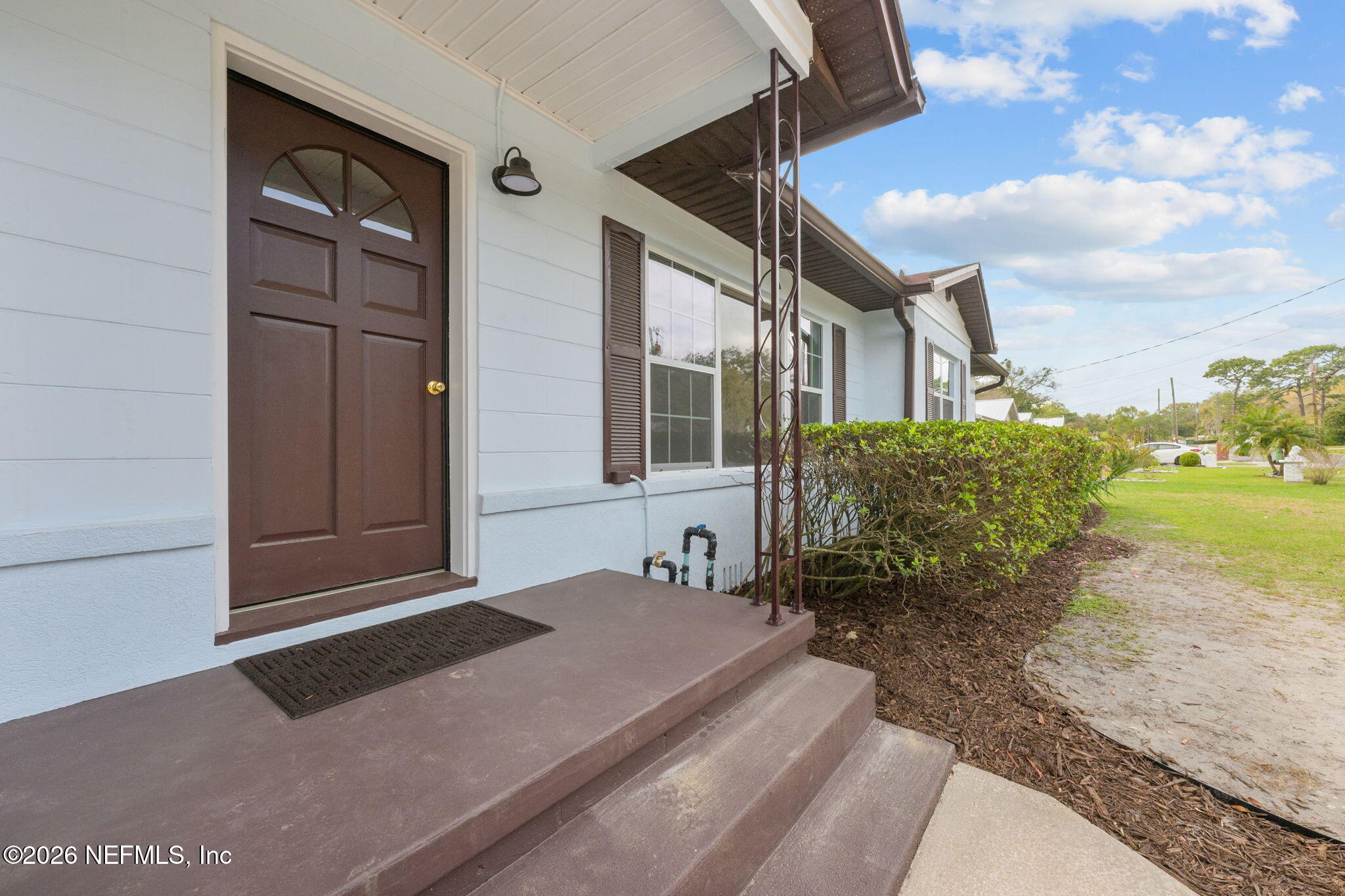 2003 Laurel Street Palatka, FL 32177 - Photo 2 of 31 a front view of a house with a yard