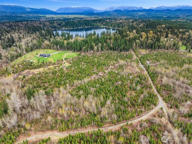 a view of a lake with a mountain in the background