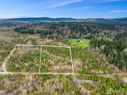 a view of a houses with a lake view