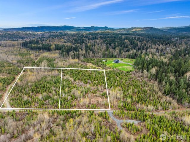 a view of a houses with a lake view