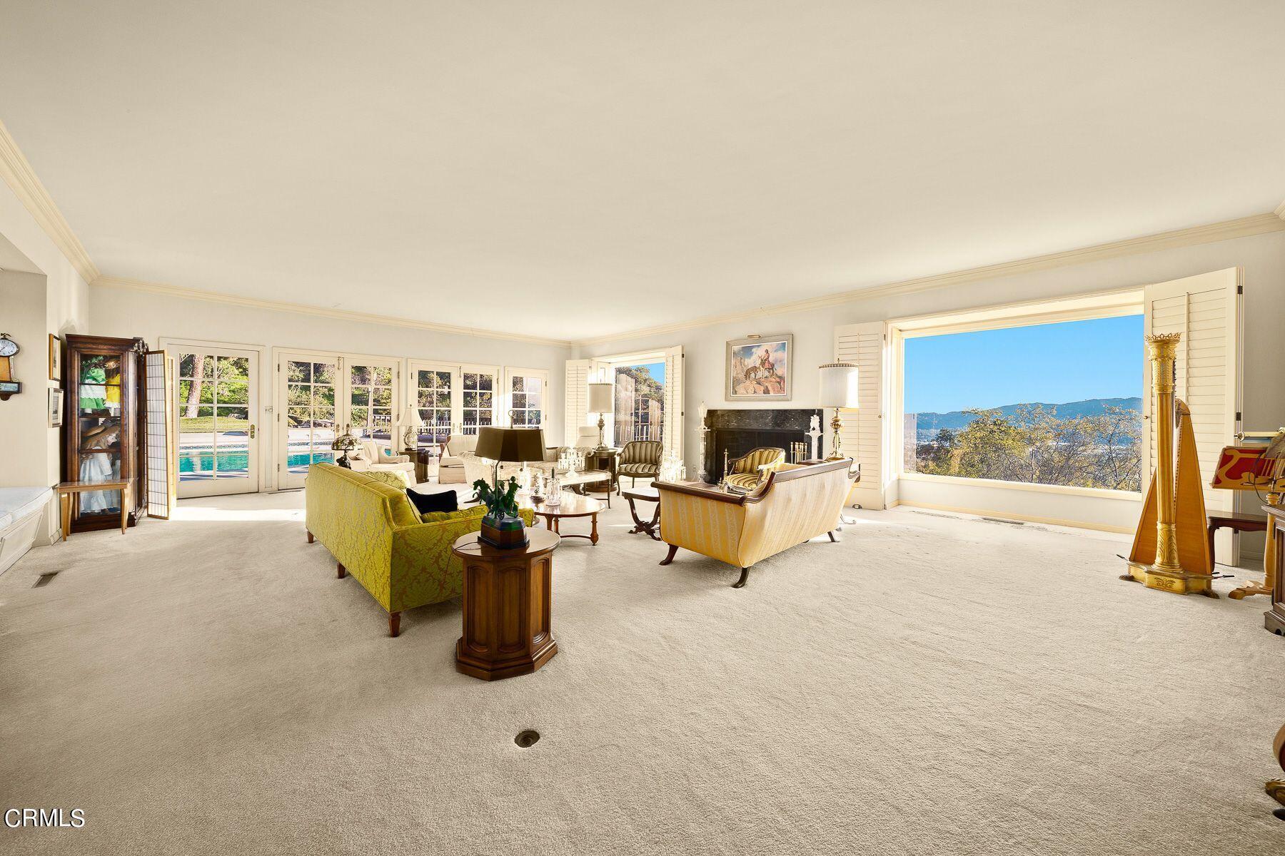 1826 Ransom Road Glendale, CA 91201 - Photo 12 of 61 a living room with furniture and a fireplace