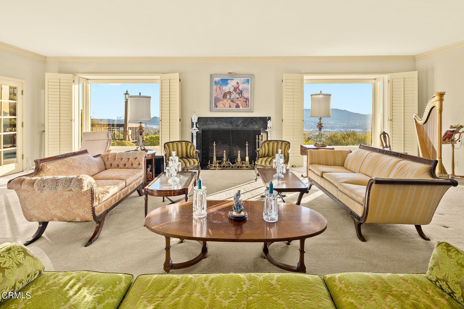 1826 Ransom Road Glendale, CA 91201 - Photo 14 of 61 a living room with fireplace furniture and a large window