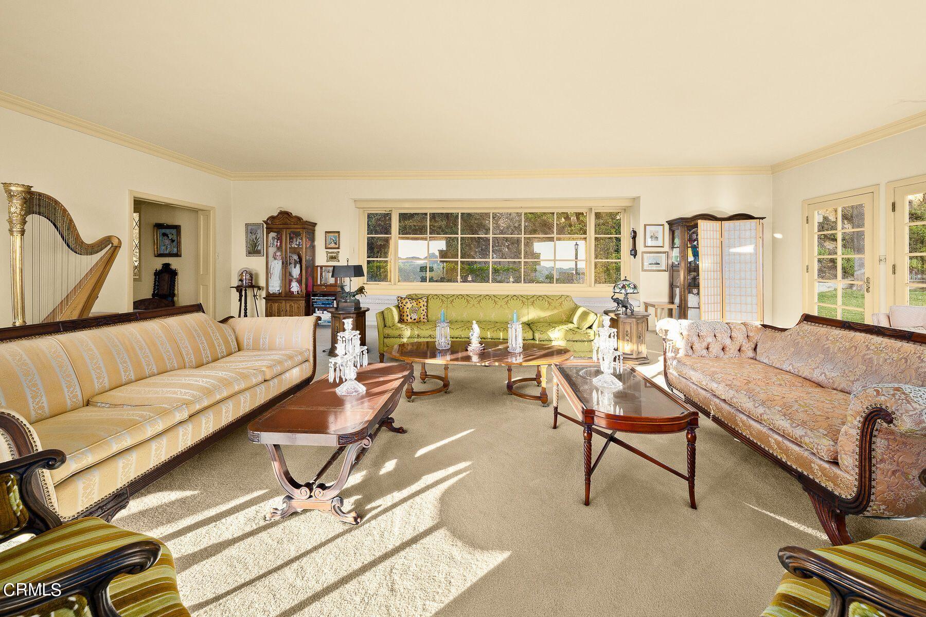 1826 Ransom Road Glendale, CA 91201 - Photo 15 of 61 a living room with furniture and a floor to ceiling window