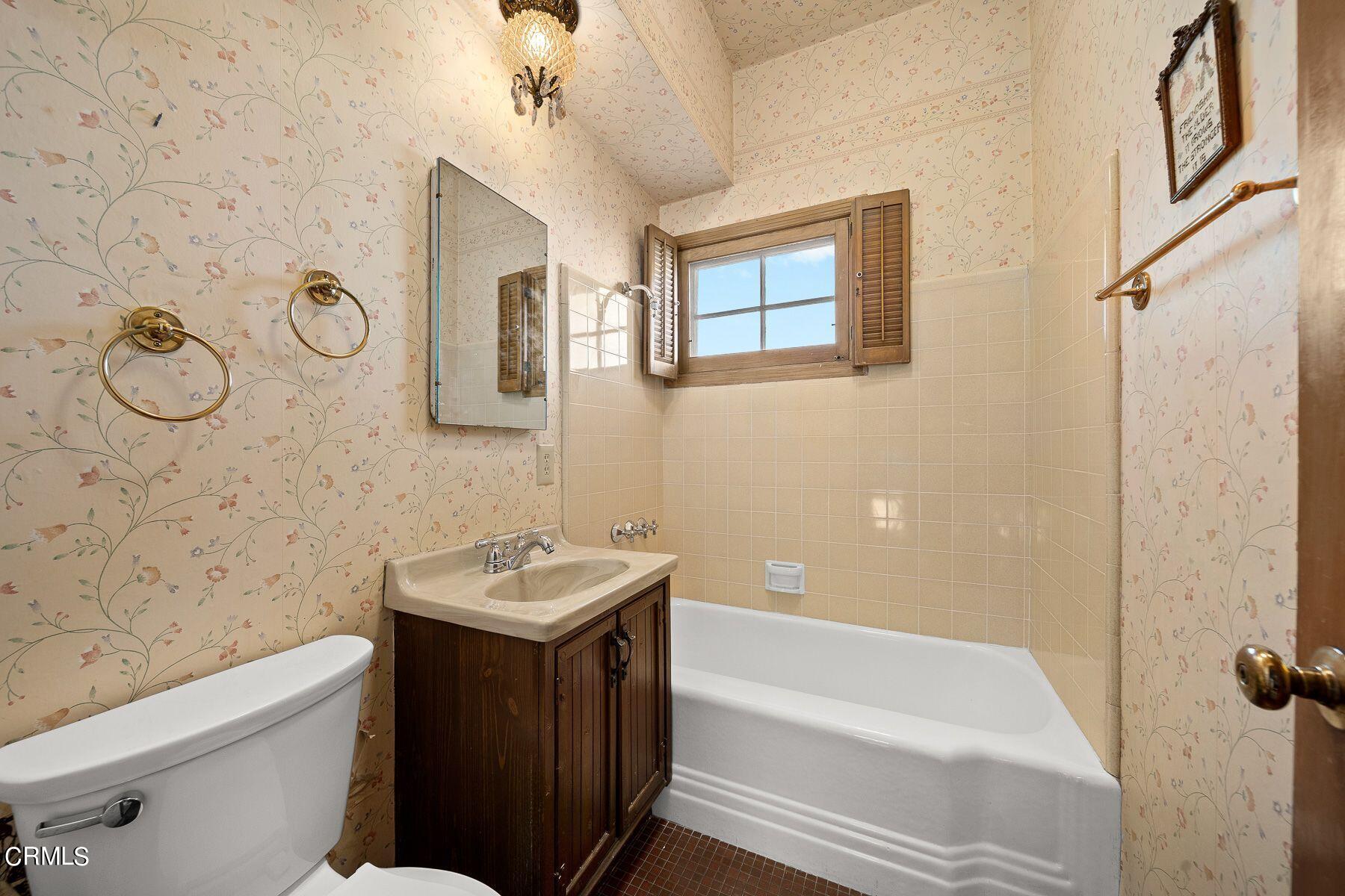 1826 Ransom Road Glendale, CA 91201 - Photo 29 of 61 a bathroom with a sink a toilet and bathtub